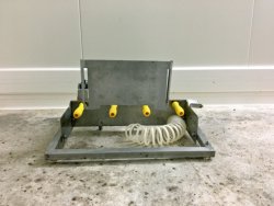 Machine à déoperculer : poussoir pneumatique